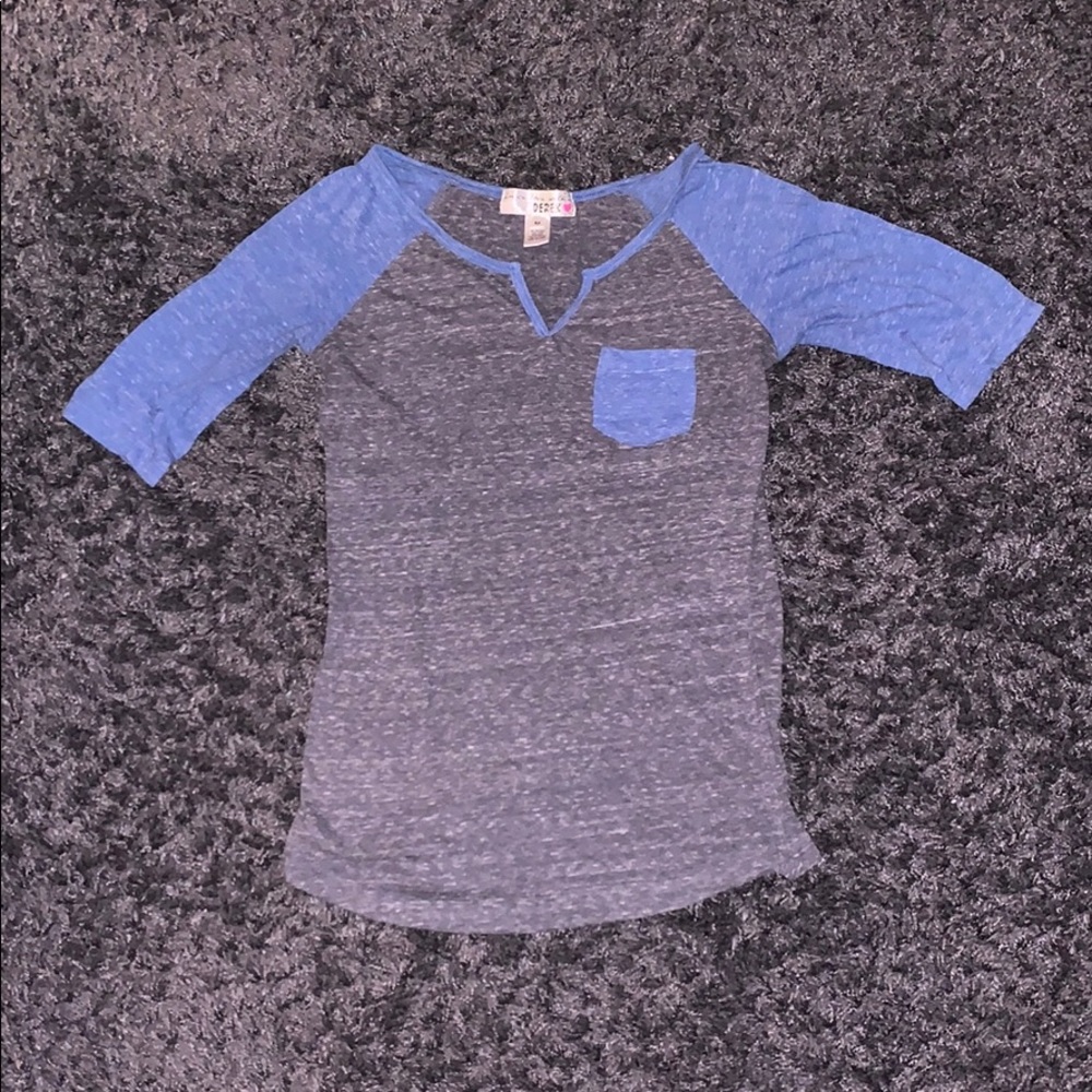 Blue and grey baseball style tee.